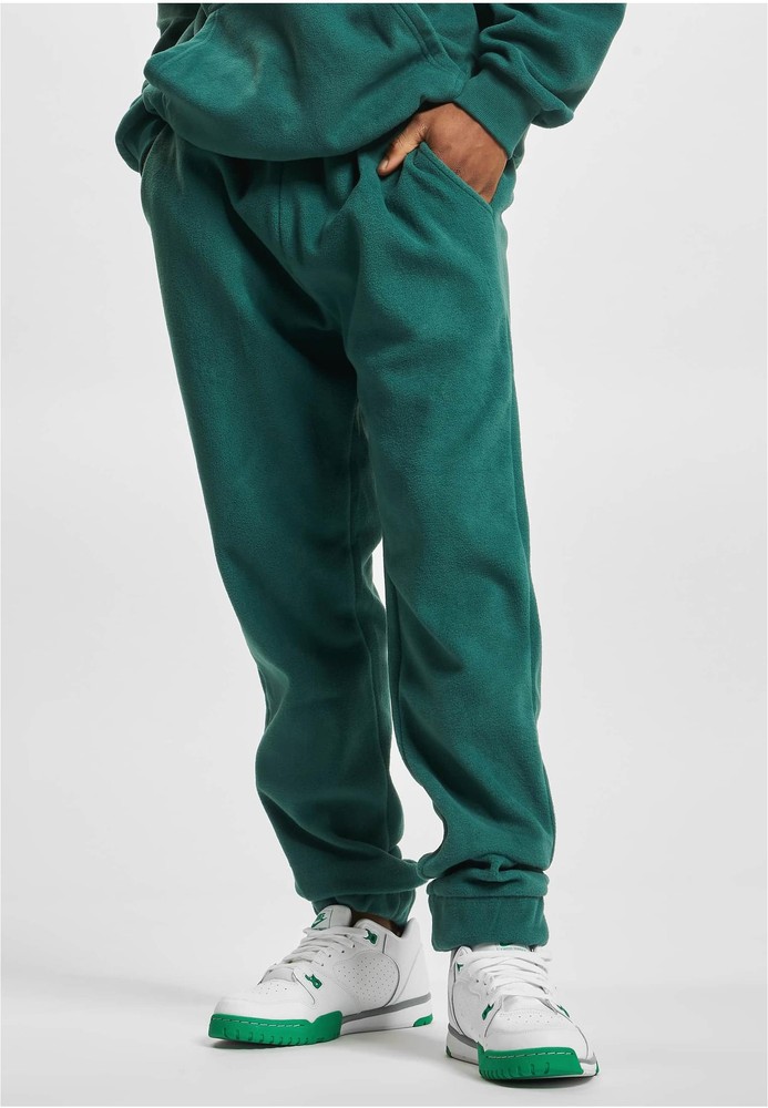 Adidas originals eqt polar fleece joggers in green best sale